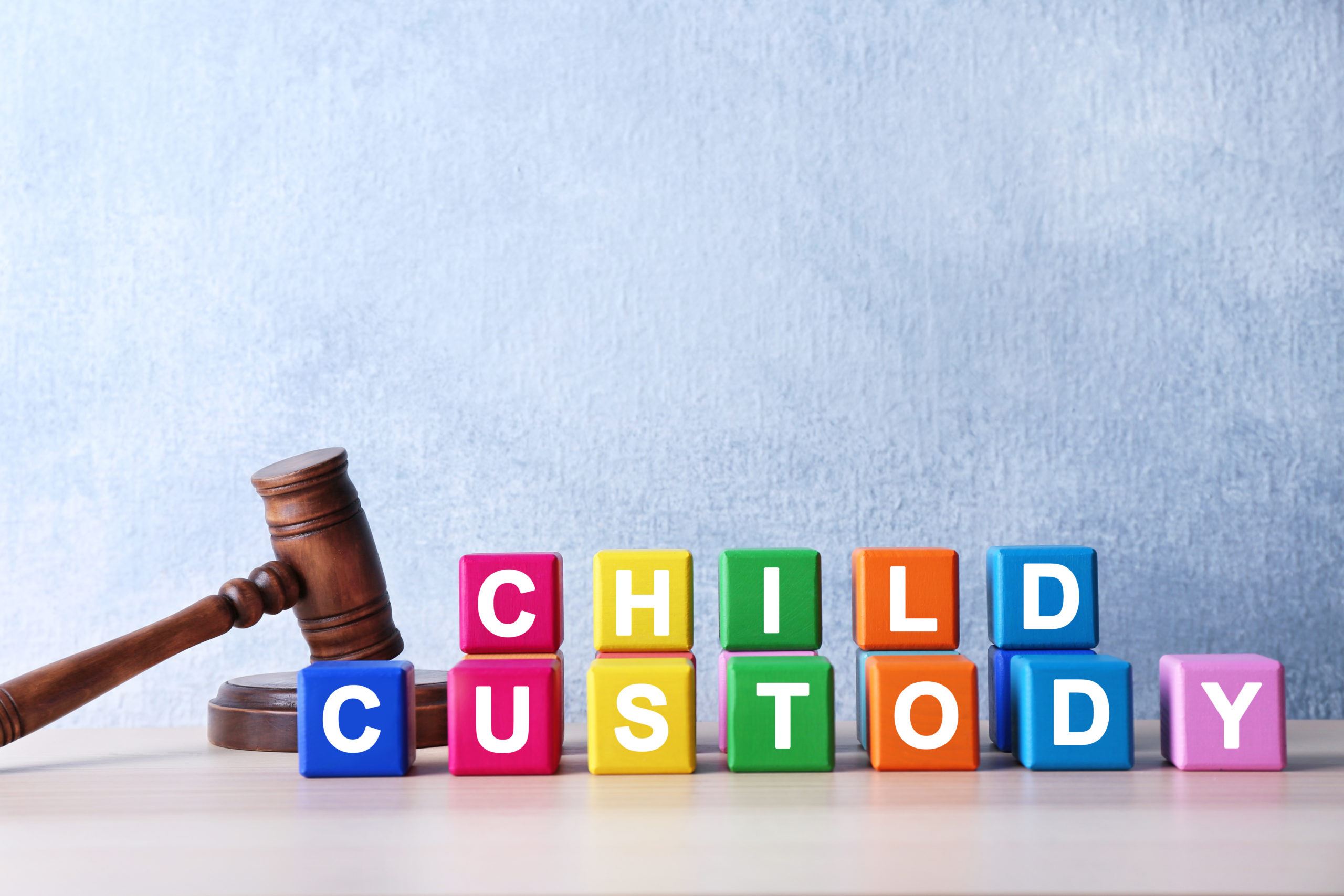 Child Custody building blocks, wooden gavel